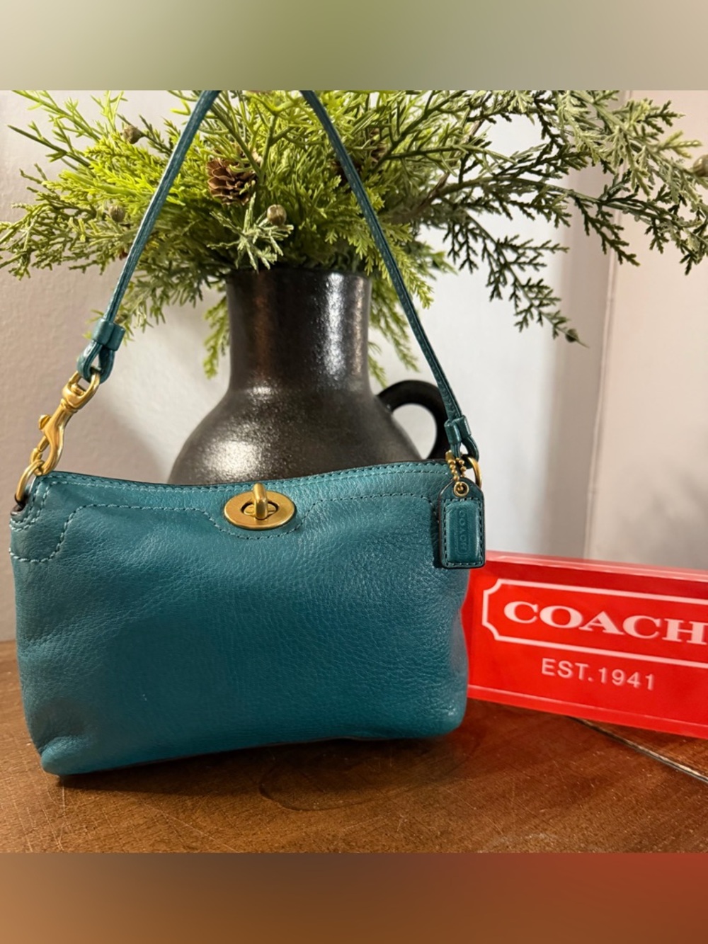 Coach Mini Teal Turnlock Wristlet